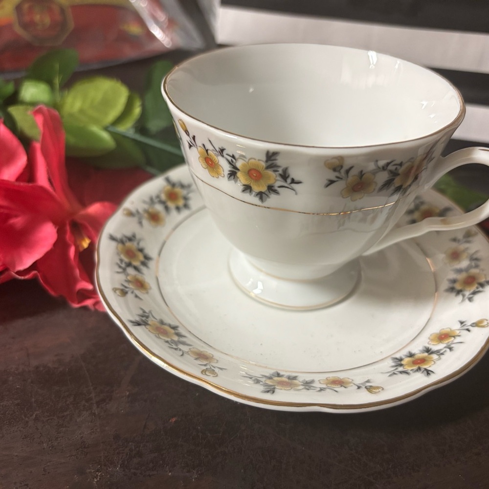 Floral White and Yellow Tea Cup and Saucer Set